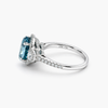 Oval Fancy Vivid Blue Lab Diamond Three-Stone Halo Ring in 18K White Gold