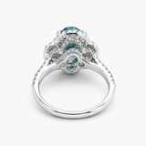 Nhẫn Halo Ba Viên Kim Cương Xanh Dương Nhân Tạo Oval Fancy Vivid Bằng Vàng Trắng 18K