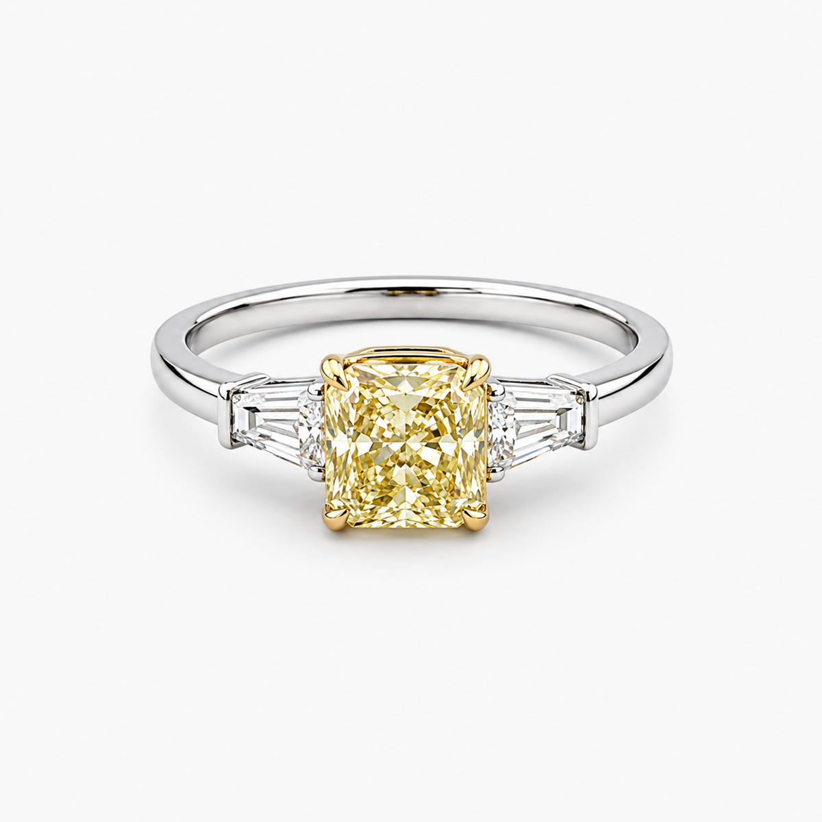 Radiant Cut Fancy Yellow Diamond Three-Stone Ring with Tapered Baguette Sidestones, 2.01 CT