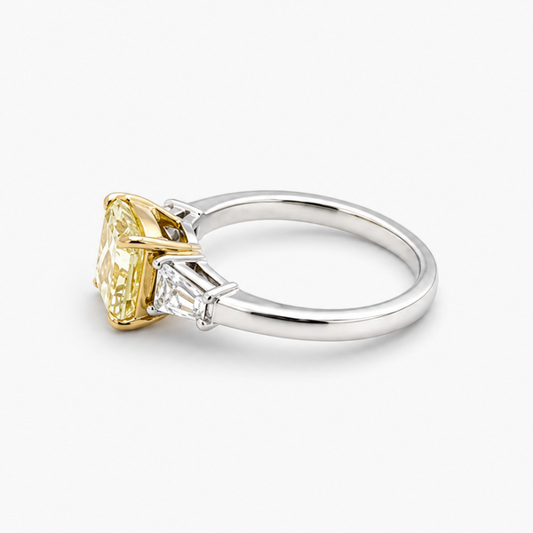 Radiant Cut Fancy Yellow Diamond Three-Stone Ring with Tapered Baguette Sidestones, 2.01 CT