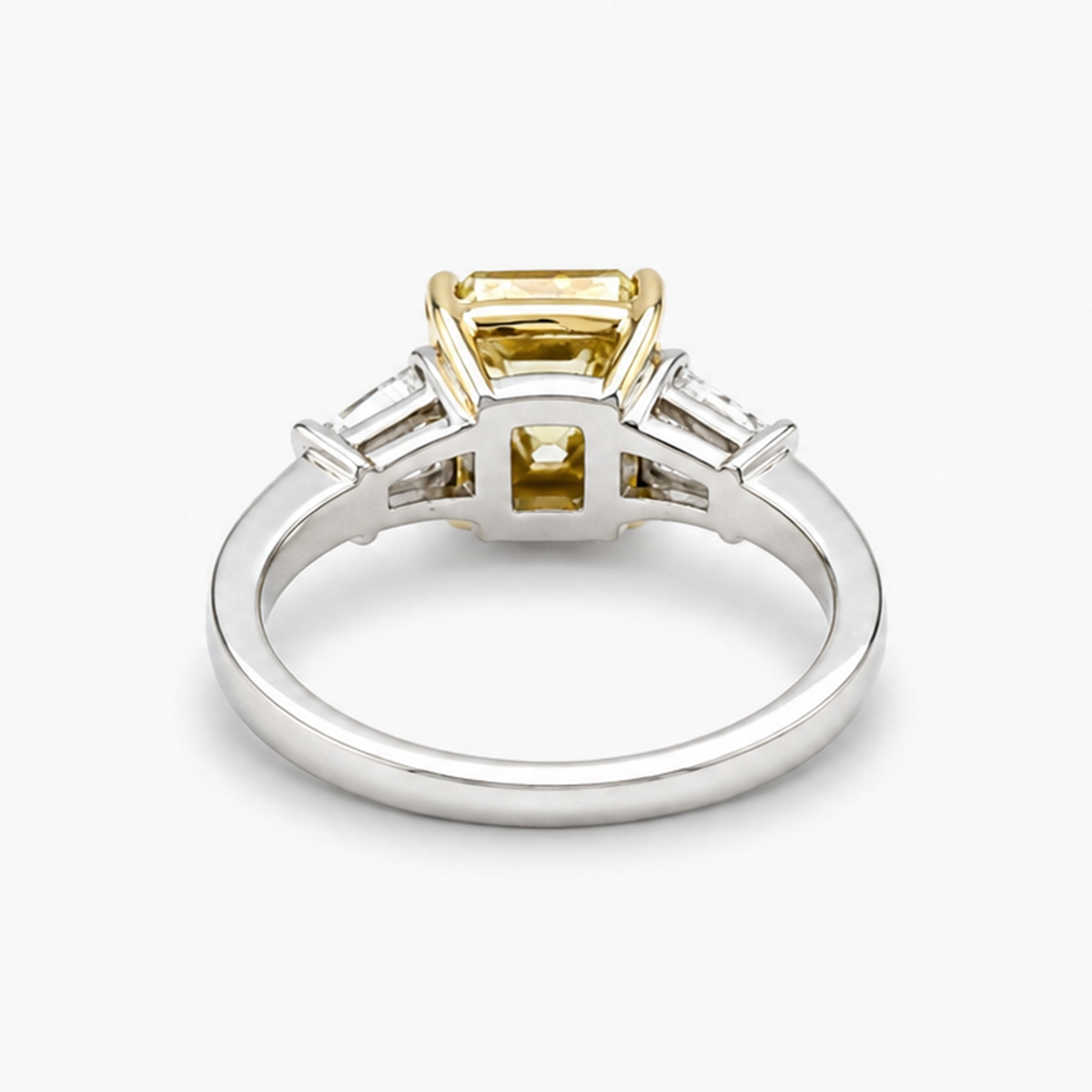 Radiant Cut Fancy Yellow Diamond Three-Stone Ring with Tapered Baguette Sidestones, 2.01 CT