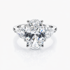 Oval 8.07 CT Lab Grown Diamond Ring Flanked by Trilliant Cut Stones 2.45 CT (G/VS2)