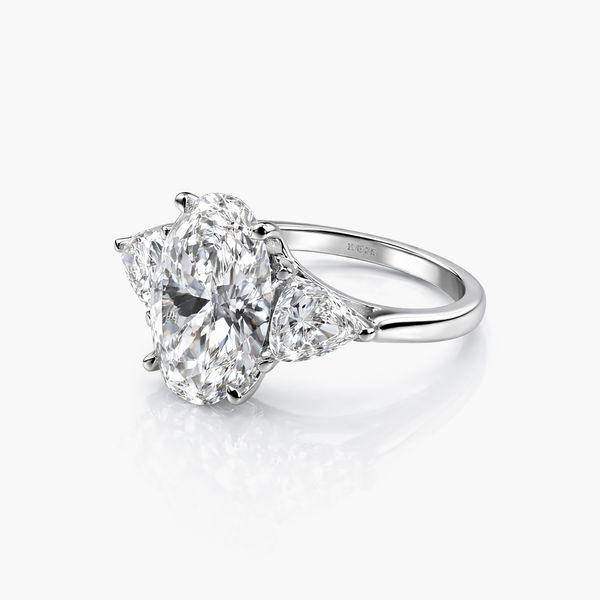Oval 8.07 CT Lab Grown Diamond Ring Flanked by Trilliant Cut Stones 2.45 CT (G/VS2)