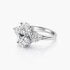 Oval 8.07 CT Lab Grown Diamond Ring Flanked by Trilliant Cut Stones 2.45 CT (G/VS2)